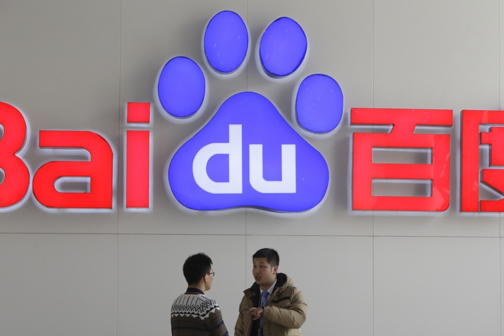 People talk in front of a Baidu's company logo at Baidu's headquarters in Beijing in this file photo taken January 16, 2014. China's biggest internet search company blew past Wall Street's targets with a 34.1 percent jump in quarterly net profit, helped by a surge in mobile revenue. Photo: Reuters