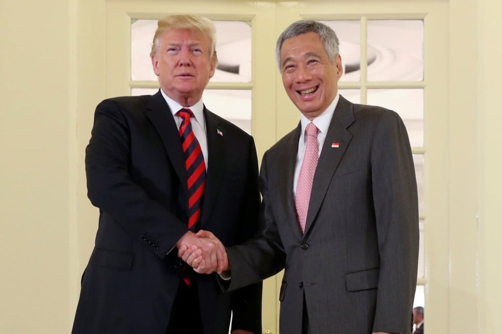 US President Donald Trump and Singapore's Prime Minister Lee Hsien Loong shake hands during a meeting at the Istana in Singapore. Photo: Reuters