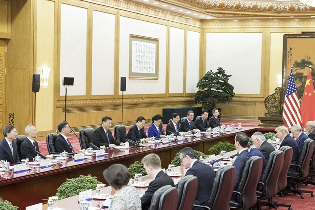 The United States and Chinese presidents meet with a phalanx of diplomats on opposite sides of long tables. Photo: Xinhua/Li Xueren via Getty Images