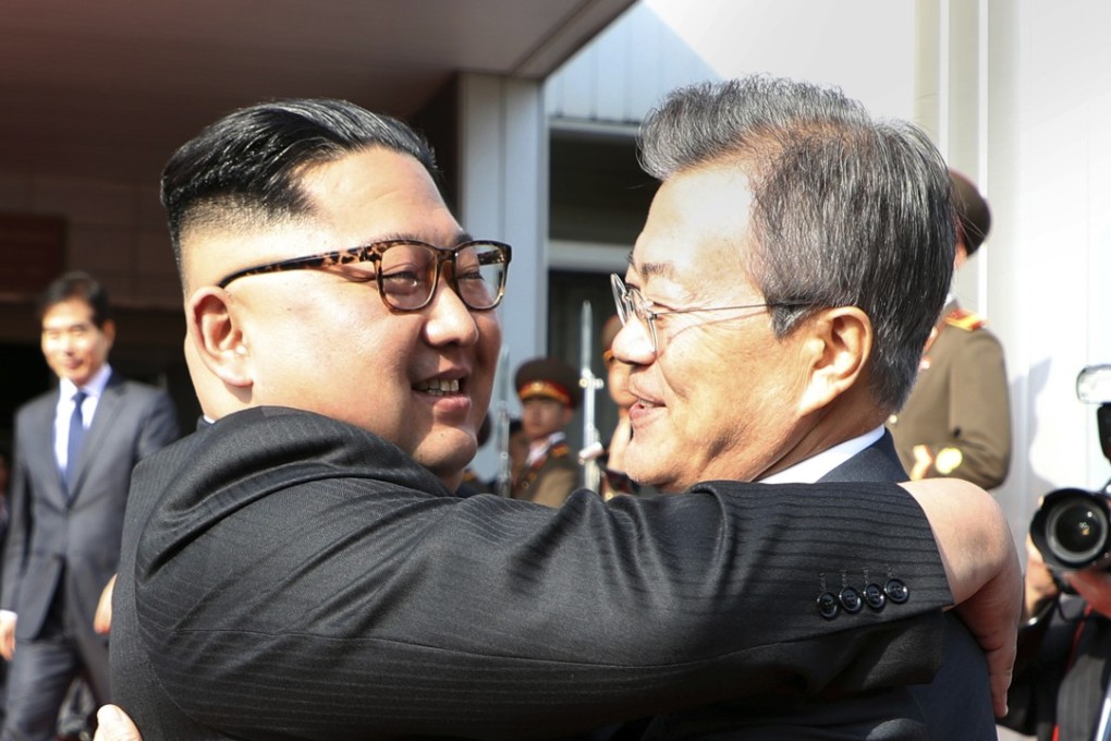 North Korean leader Kim Jong-un and South Korean President Moon Jae-in embrace each other after their meeting at the northern side of the Panmunjom in North Korea on May 26. Photo: AP