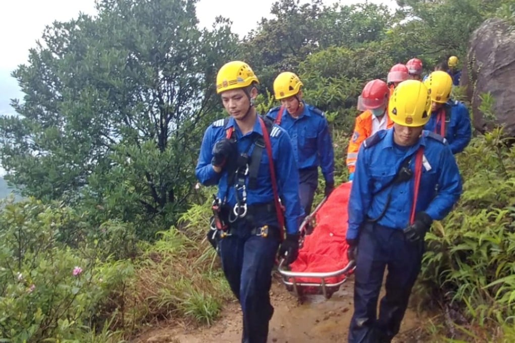 Injured female hiker rescued after spending 12 hours trapped on Hong ...