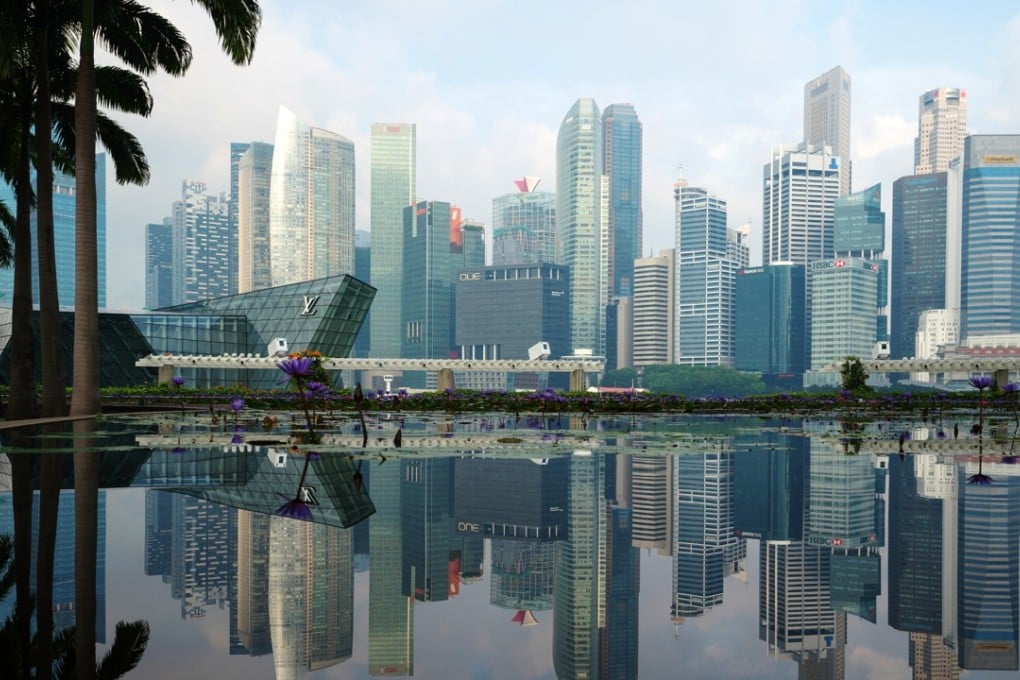 The central business district of Singapore. The city thrives on higher savings, thanks largely to the employees’ Central Provident Fund, and affordable housing which gives residents greater flexibility in allocating savings to investments. Photo: Bloomberg