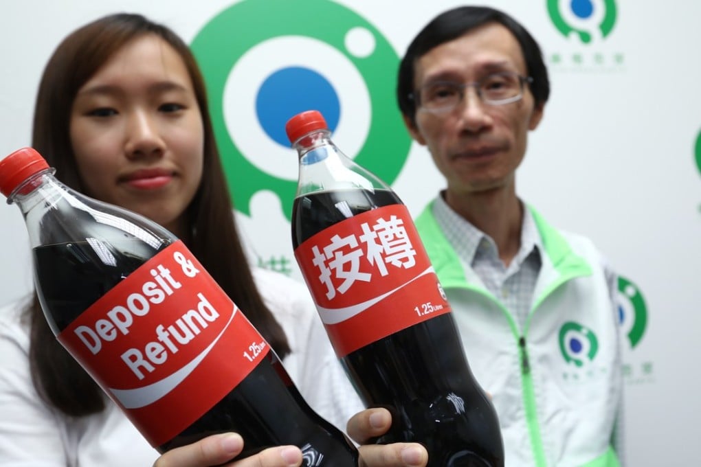Edwin Lau, Green Earth’s executive director, and Cathy Ng, a Hong Kong Baptist University student who helped with the group’s study, as they call for introduction of a deposit scheme for plastic bottles. Photo: Nora Tam