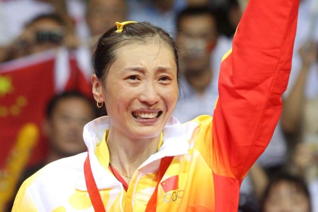 Zhang Ning of China celebrates winning the women’s badminton singles gold medal at the Beijing 2008 Olympics. Photo: EPA