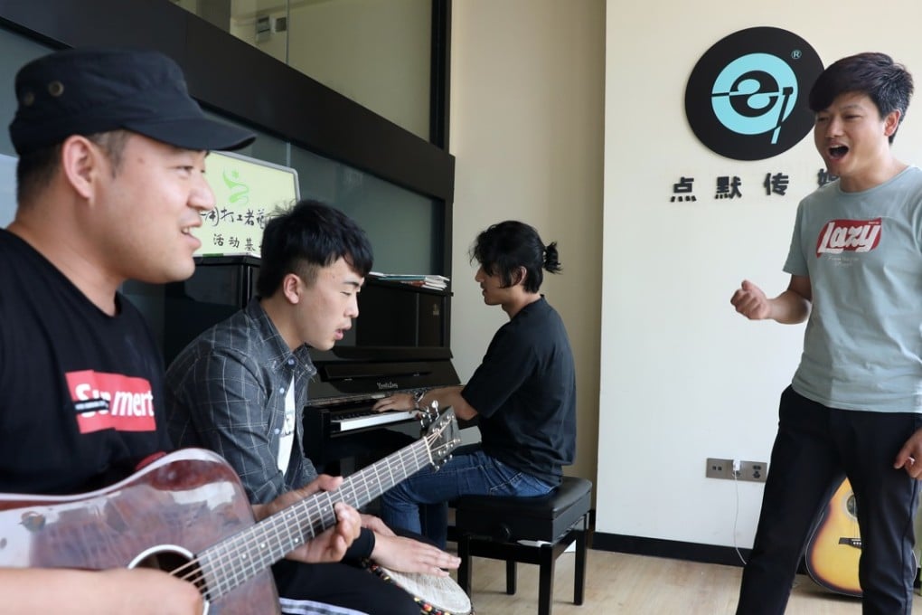 The Changsanjiao Migrant Workers Art Ensemble brings music into the lives of those working as labourers in China. Photo: Simon Song