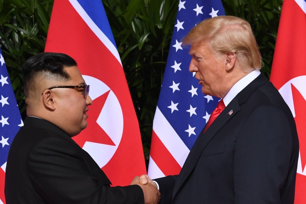 North Korean leader Kim Jong-un with US President Donald Trump at the start of their historic summit, at the Capella Hotel on Sentosa Island, Singapore. Photo: Agence France-Presse