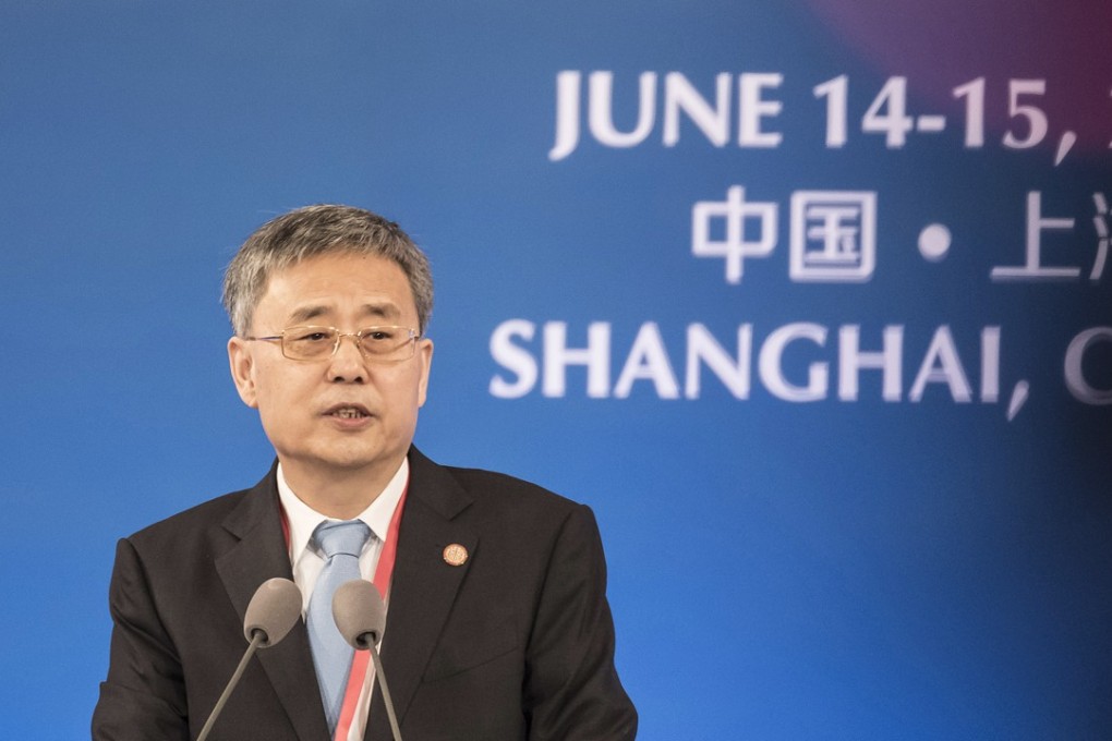 Guo Shuqing, chairman of the China Banking Regulatory Commission, speaks during the Lujiazui forum in Shanghai, on Thursday. Photo: Bloomberg
