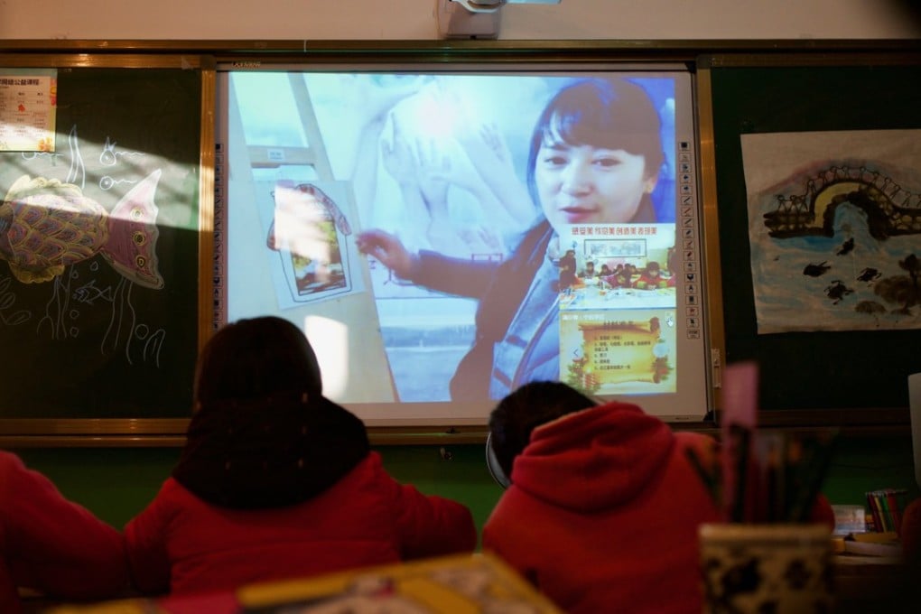 Students learn from a live streaming class on an online education platform China’s western Gansu province. Photo: SCMP