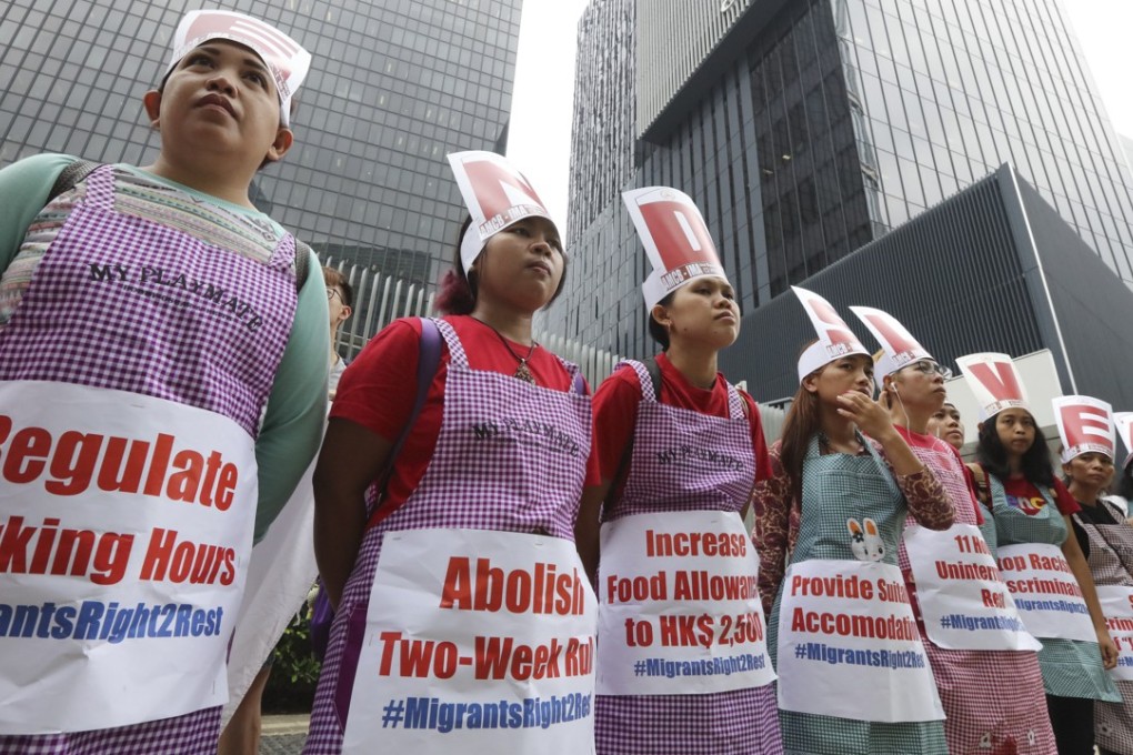 Domestic workers and their supporters marched to the government headquarters. Photo: Felix Wong