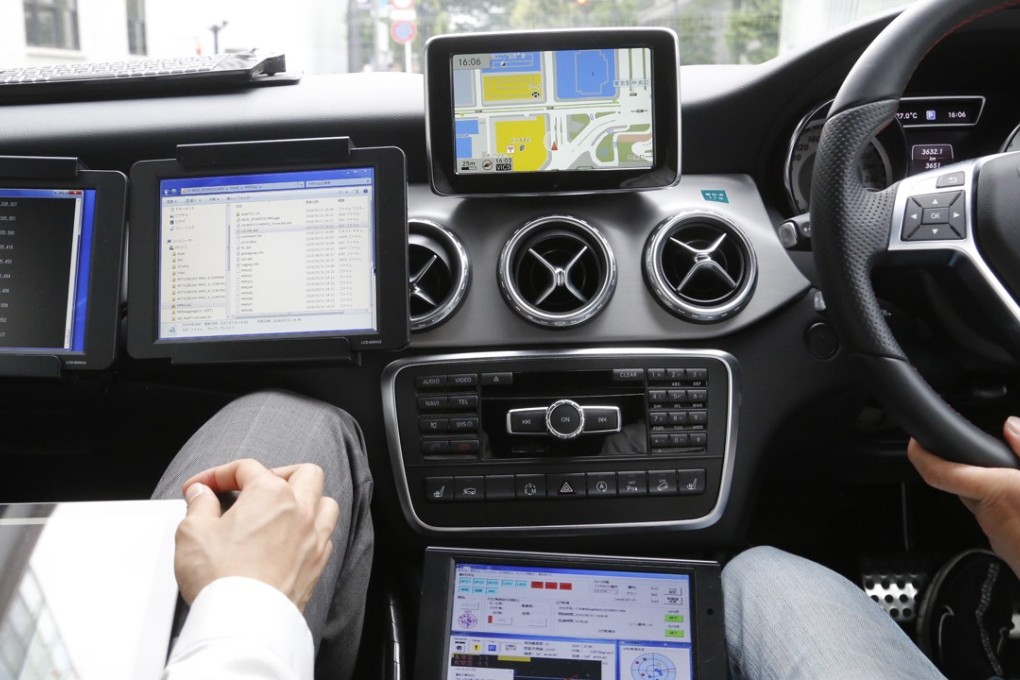 A car monitor shows a 3D digital map as it's driven through Tokyo streets. Technology companies are racing to develop ultra-precise three-dimensional digital maps that can guide self-driving cars to within inches of where they are supposed to be. Photo: AP
