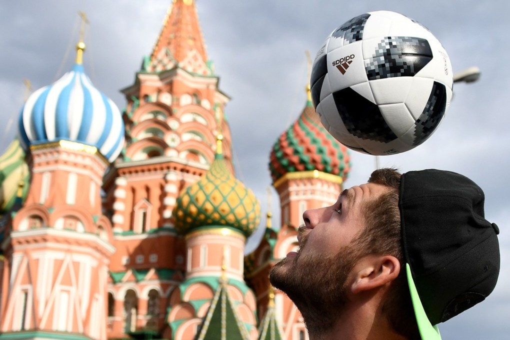 A man plays football with the Adidas Telstar 18. Photo: AFP