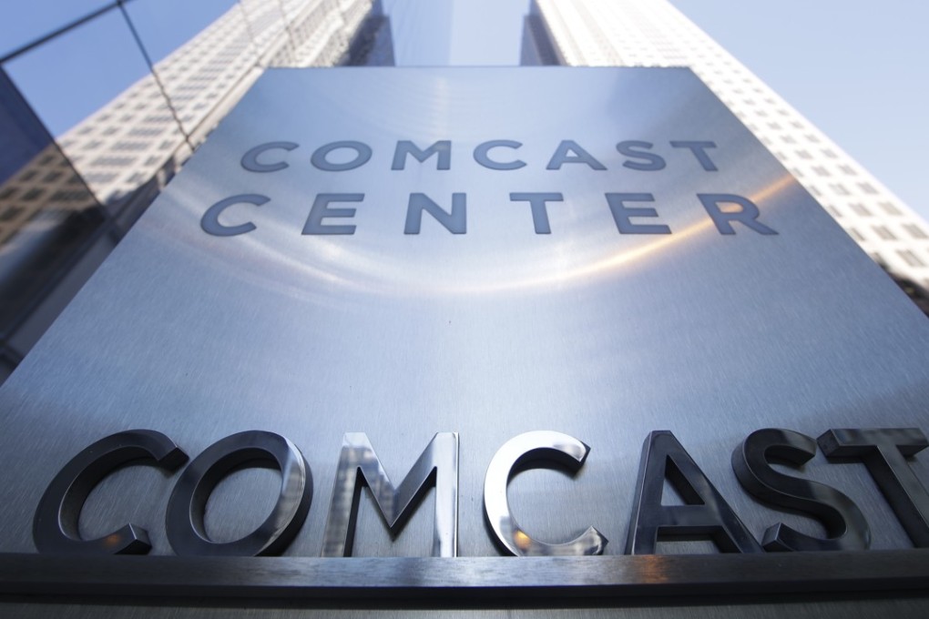 A sign is seen outside the Comcast Centre in Philadelphia in 2017. Comcast made a US$65 billion bid on Wednesday for Fox's entertainment businesses, setting up a battle with Disney to become the next mega-media company. Photo: AP
