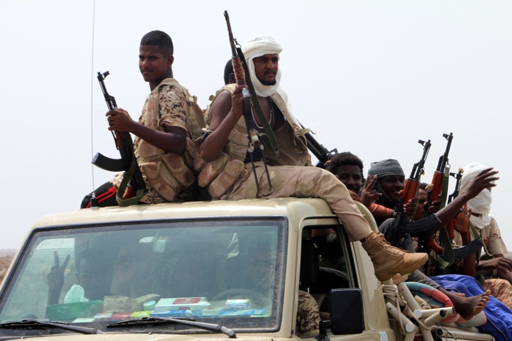 Sudanese forces fighting alongside the Saudi-led coalition in Yemen gather near the outskirts of the western port city of Hodeidah, Yemen, on Tuesday. The military coalition and Yemeni government forces have launched an assault on the Houthi-controlled main port. Photo: EPA-EFE