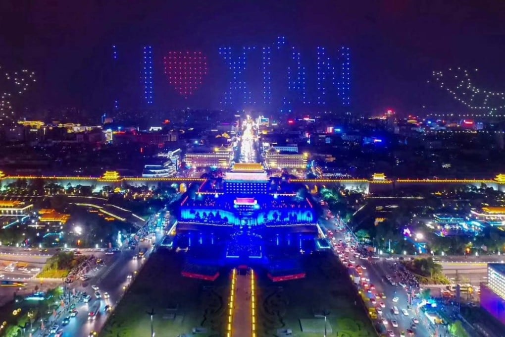 Chinese drone maker Ehang breaking the Guinness World Record for the largest number of drones used in an airborne performance in Xian. Photo: SCMP