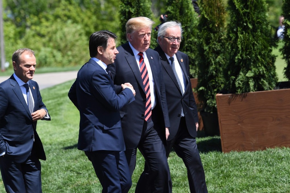 From left, the President of the European Council Donald Tusk, Italian Prime Minister Giuseppe Conte, US President Donald Trump and the President of the European Commission Jean-Claude Juncker arrive for a family photo during the G7 Summit in La Malbaie, Quebec, Canada, on June 8. Photo: Agence France-Presse