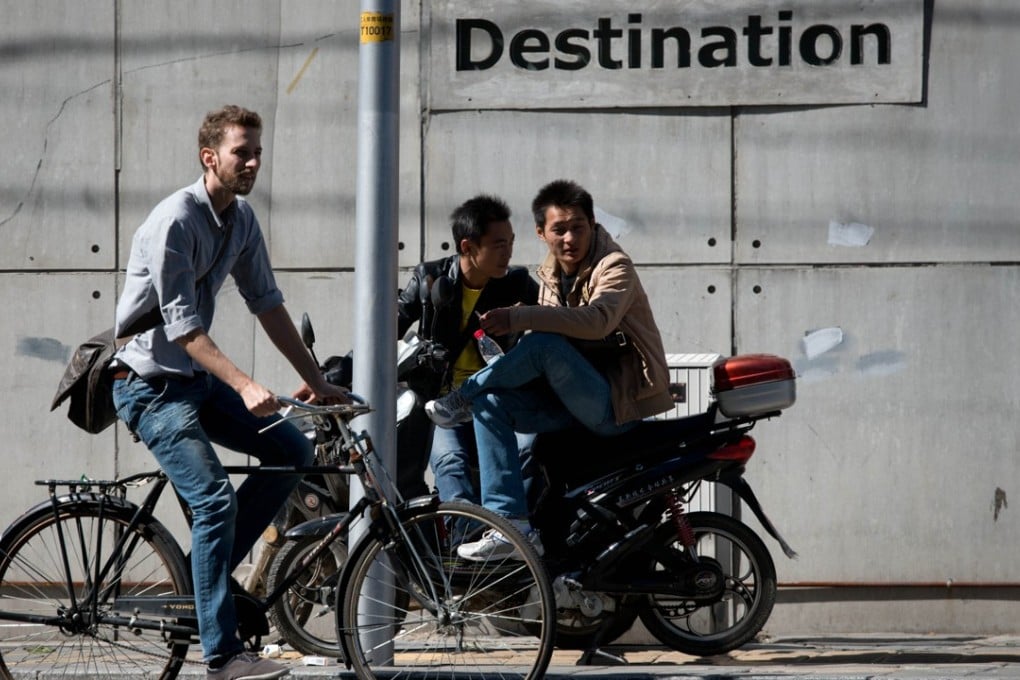 China ranked fifth in the world in 2016 as a source country for remittances. The United States topped the list. Photo: AFP