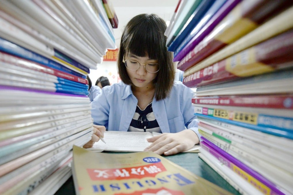 A high school student prepares for the annual “Gaokao” or college entrance examinations in China. So far this year, three Chinese after-school education providers have listed in the US. Photo: AFP