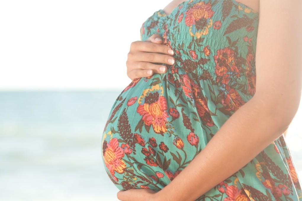 Floral maxi dresses can make the transition from pregnant to mother look stylish.