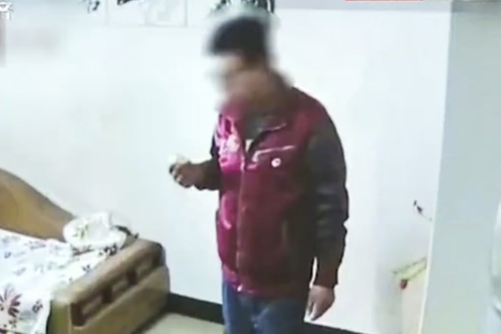 A man from eastern China was detained for stealing a surveillance camera from a local office building. Photo: News.163.com