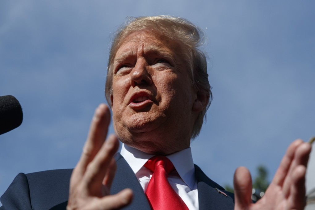 US President Donald Trump speaks to reporters at the White House on Friday in Washington. Photo: AP