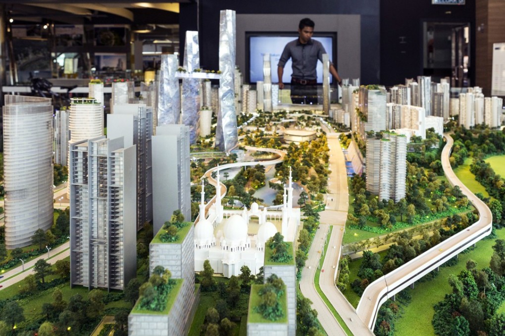 A model of the proposed Bandar Malaysia development at a showroom in Kuala Lumpur in October 2016. The development was to host terminals for a planned high-speed rail line connecting the Malaysian capital to Singapore, but Malaysia’s newly elected prime minister Mahathir Mohamad has said he may cancel it. Photo: Bloomberg