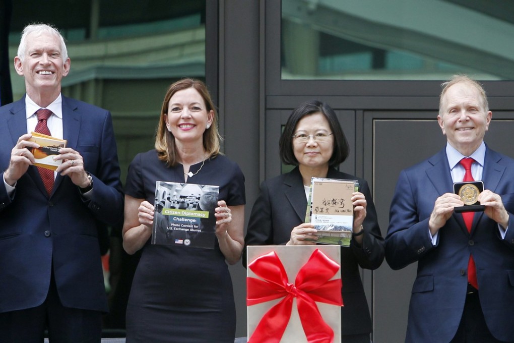 Assistant secretary of state for educational and cultural affairs Marie Royce (second left) was the most senior US official to attend the dedication ceremony for the new American Institute in Taiwan. Photo: AP