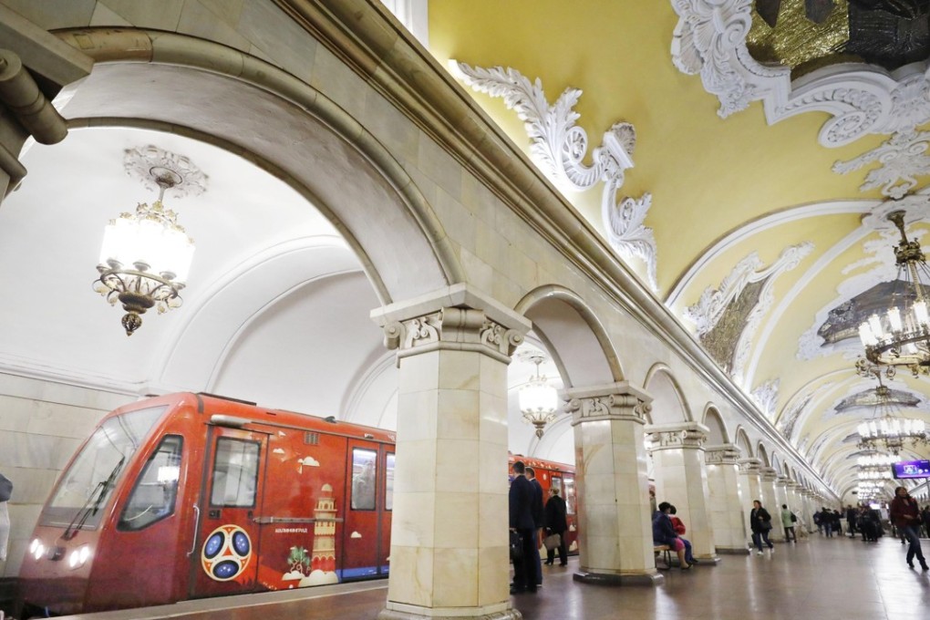 A train featuring designs aimed at promoting the World Cup in Russia is seen at a subway station platform in Moscow. Photo: Kyodo