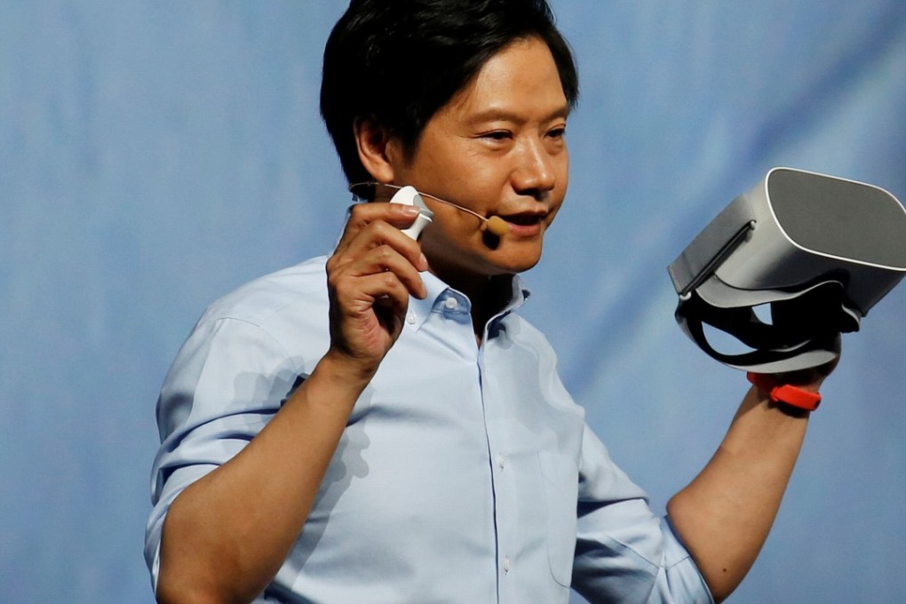 Xiaomi was founded by Lei Jun, who is seen holding a new virtual reality headset during a product launch in Shenzhen on May 31. Photo: Handout