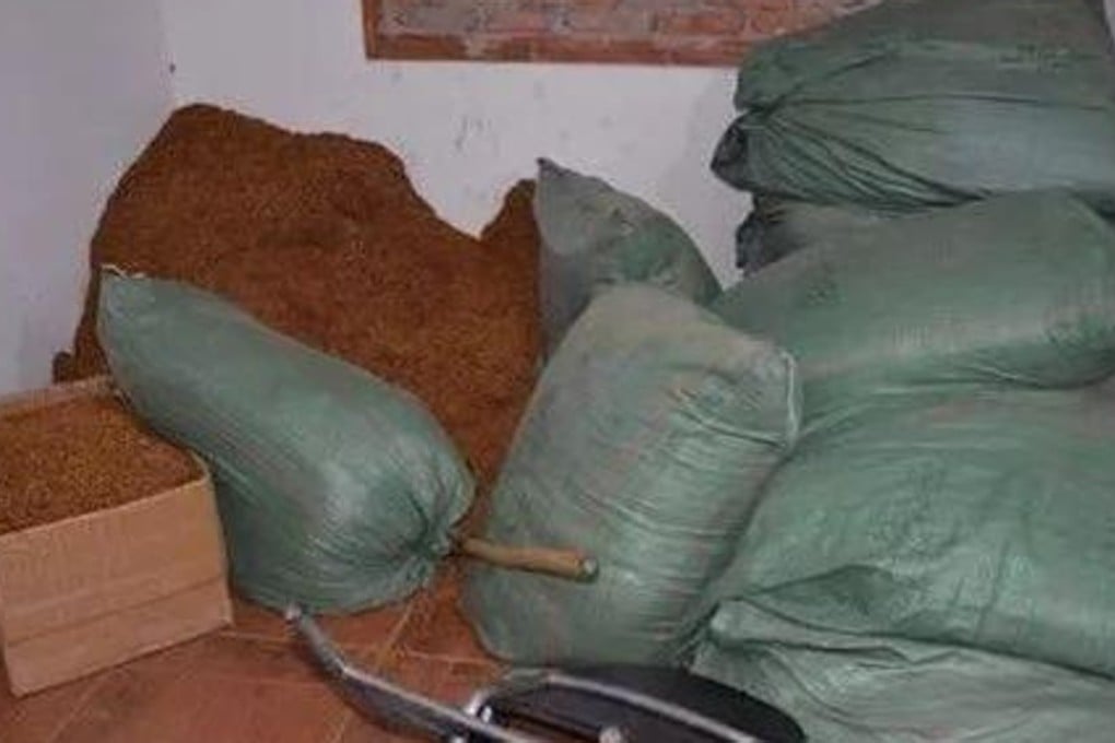 A Chinese crime gang is accused of manufacturing about 10,000 fake cigarettes a day for sale across the country. Photo: News.163.com