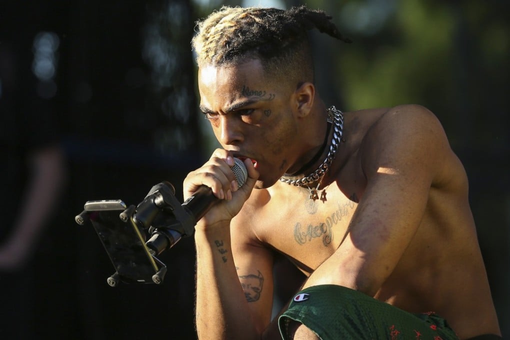 XXXTentacion performs during the second day of the Rolling Loud Festival in downtown Miami on May 6, 2017. Photo: TNS