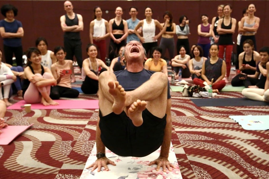 Ashtanga yogi David Swenson enjoys himself while teaching a class during the Asia Yoga Conference at the Hong Kong Convention and Exhibition Centre in Wan Chai. Photo: Edmond So
