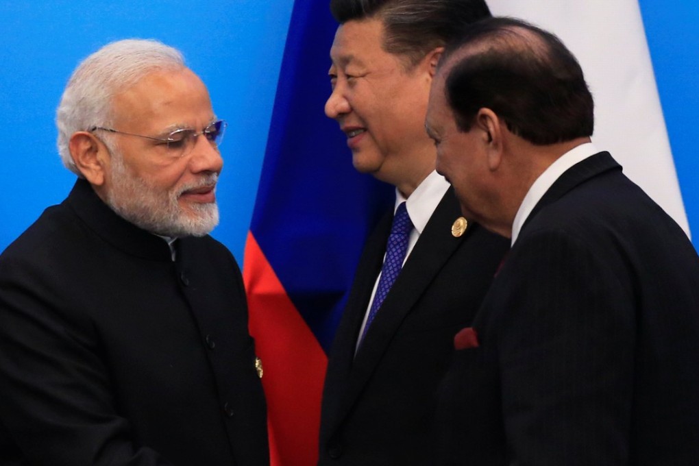 A handshake between Indian Prime Minister Narendra Modi and Pakistani President Mamnoon Hussain was one of the big moments at the Shanghai Cooperation Organisation summit in Qingdao. Photo: Reuters