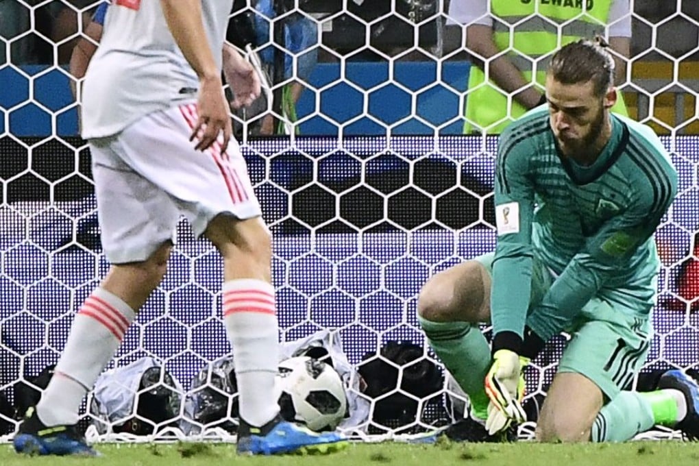 David De Gea (right) fails to block a second goal by Cristiano Ronaldo. Photo: AFP