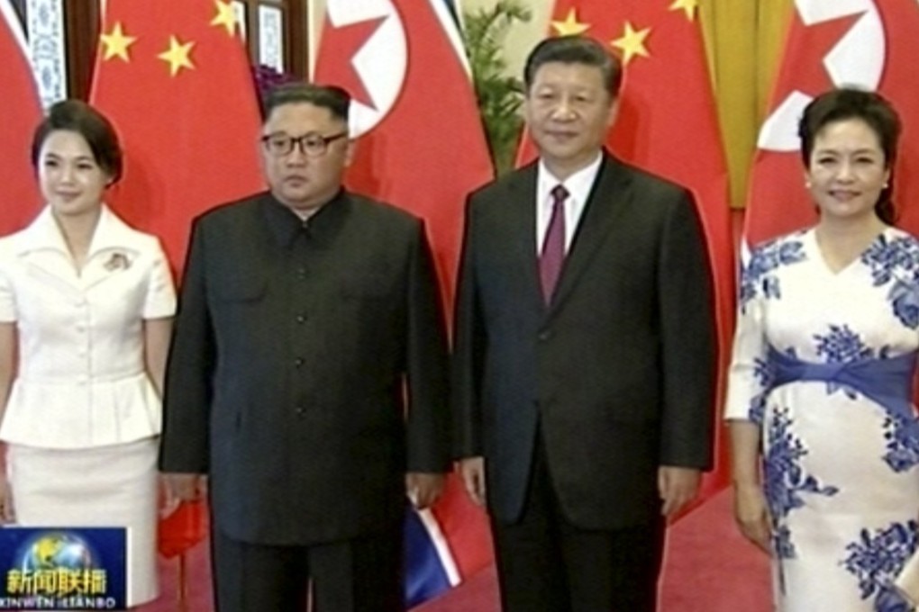 North Korean leader King Jong-un (second left) returned to Beijing for his third visit in three months on Tuesday. He is pictured with (from left) his wife, Ri Sol-ju, Chinese President Xi Jinping and Peng Liyuan. Photo: AP