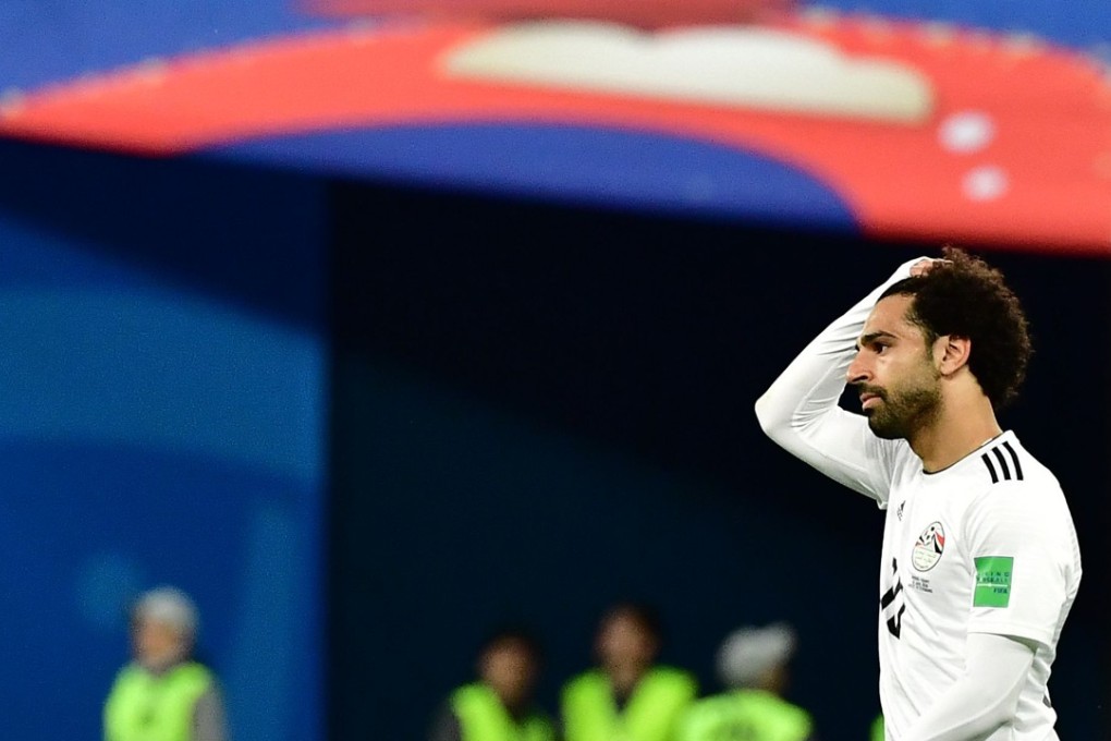 Egypt's forward Mohamed Salah reacts at the end of the Russia 2018 World Cup group A loss to Russia. Photo: AFP