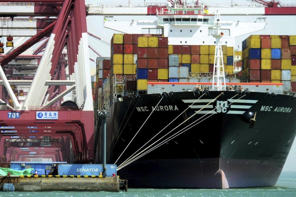 Containers are loaded onto a cargo ship in Qingdao. China imported US$140 billion of US products last year but exported US$400 billion of goods to America. Photo: Chinatopix via AP