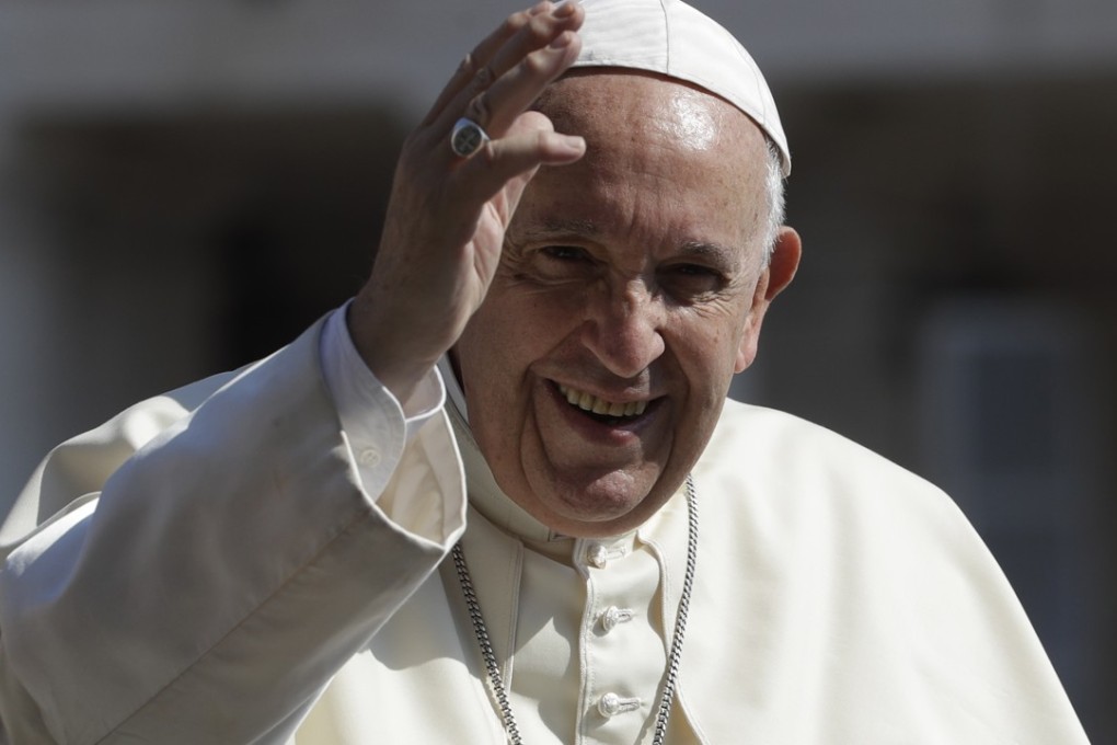 Pope Francis salutes the faithful during his weekly general audience in St Peter’s Square at the Vatican on Wednesday. Photo: AP