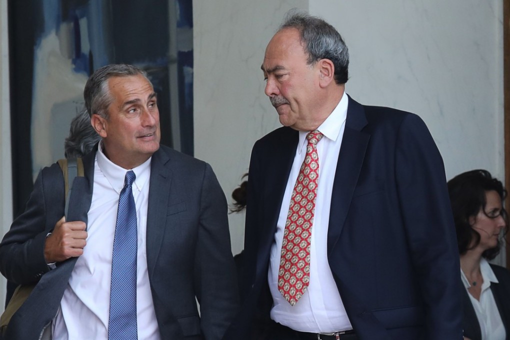 Brian Krzanich (left) speaks with Accel’s partner Joe Schoendorf. Photo: AFP