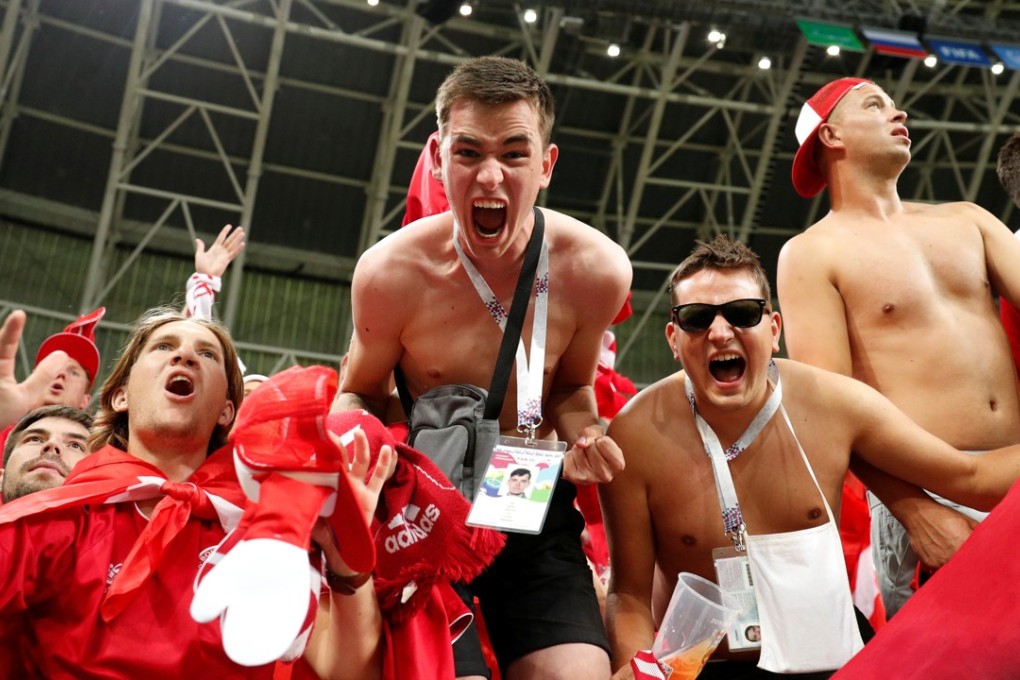 Danish fans didn’t lose their shirts in Spot Bar in Soho but they did in Mordovia Arena, Saransk, after their victory over Peru. Photo: Reuters