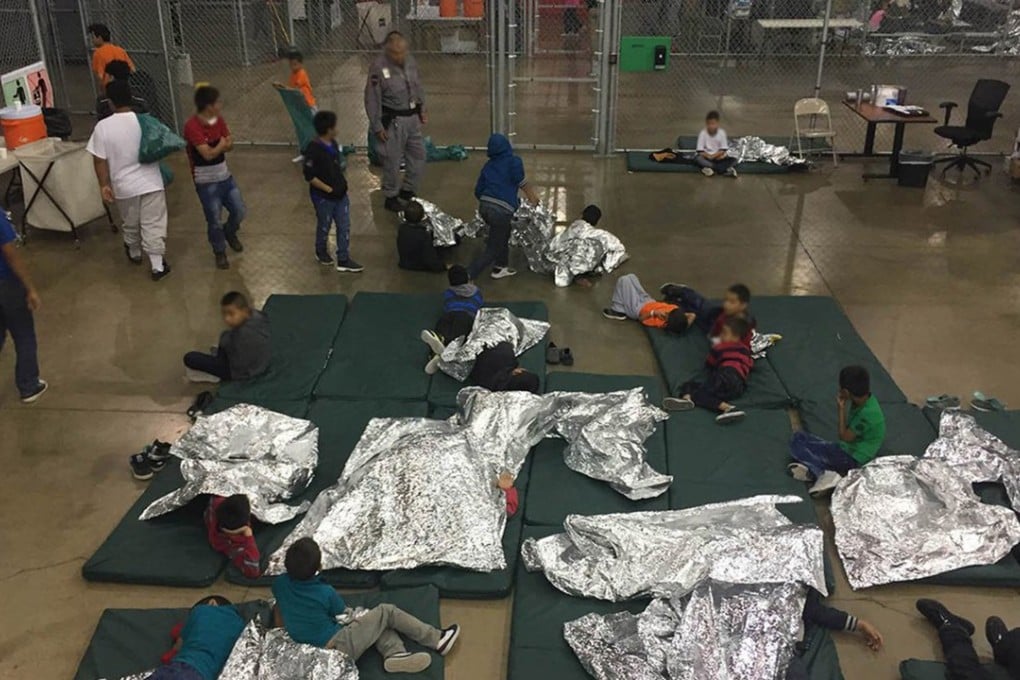 An undated handout photo shows people inside a US border patrol processing centre, in McAllen, Texas. EPA-EFE/US Customs and Border Protection