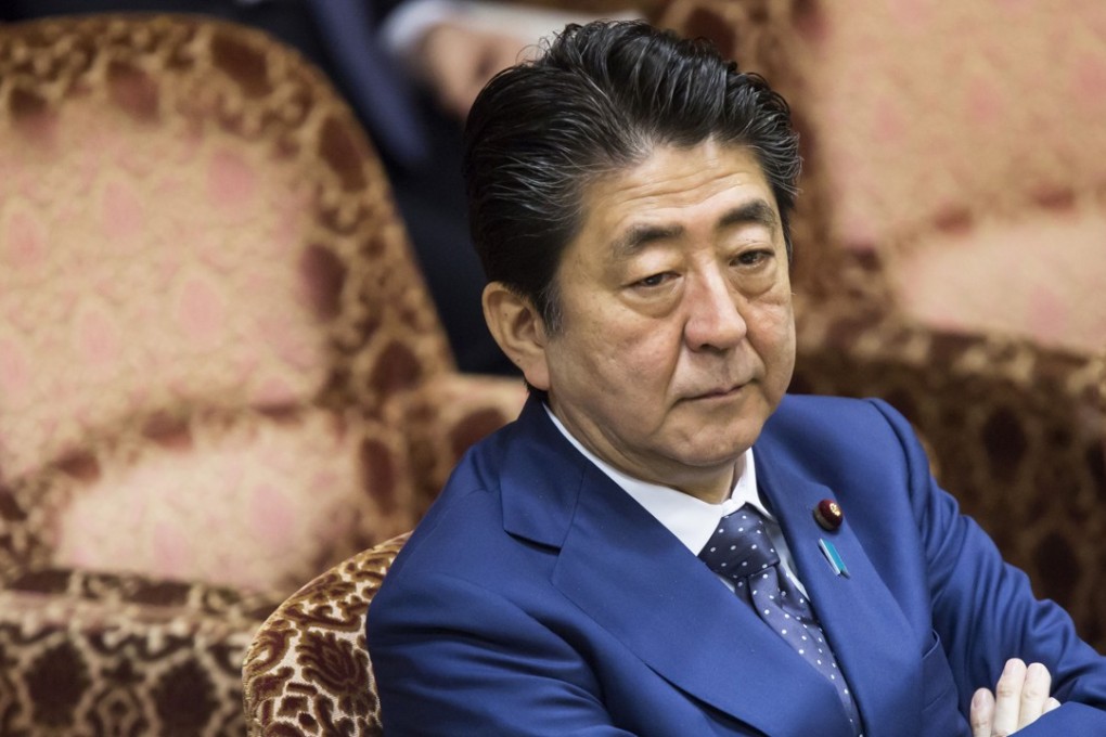 Prime Minister Shinzo Abe attends a budget committee session at the Upper House of Parliament in Tokyo on March 14. Photo: Bloomberg