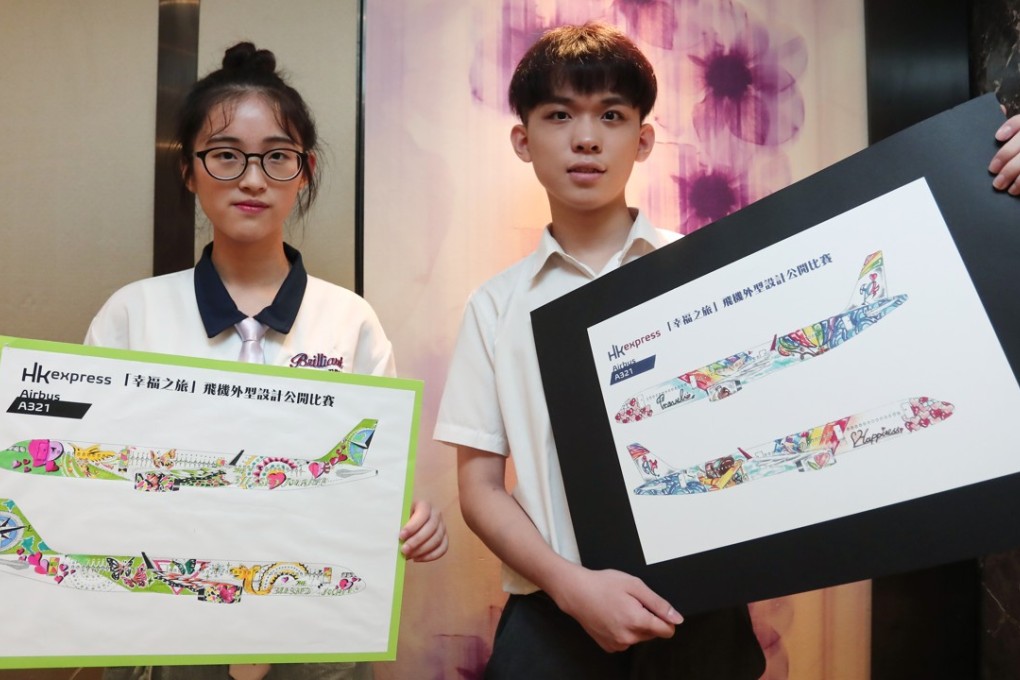 Wu Fengru (left) and Chan Pak-fung show their winning designs. Photo: Jonathan Wong