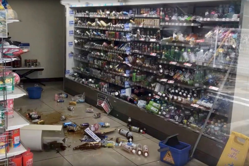 Drinks are scattered on the floor of a shop after the earthquake in Osaka. Photo: Reuters/Twitter/@tw_hds