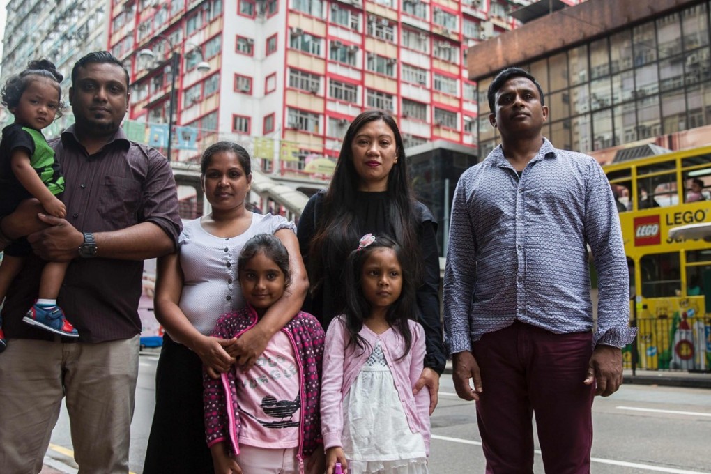 (From right) Sri Lankan refugee Ajith Puspa; Filipino refugee Vanessa Rodel with her daughter Keana; Sri Lankan refugees Nadeeka Nonis with her partner Supun Thilina Kellapatha and children Sethumdi and Dinath. Photo: AFP