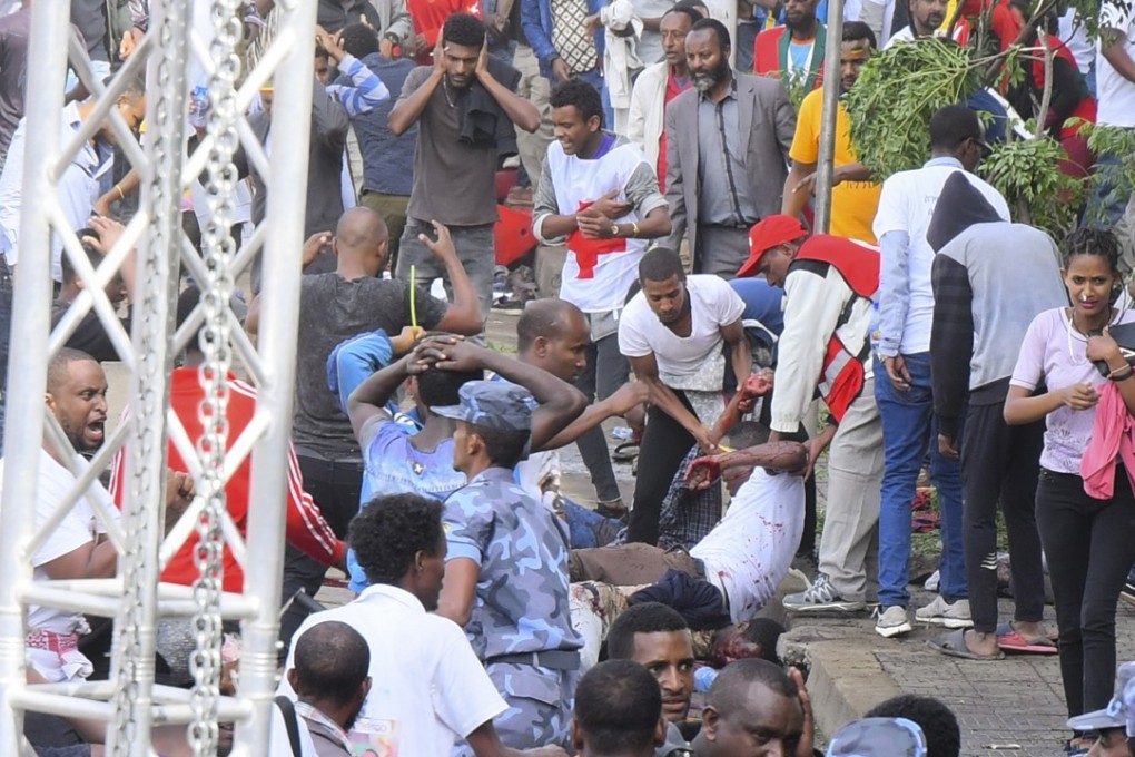 Security officers gather at the scene of an explosion during a massive rally in Meskel Square in Addis Ababa. Photo: EPA
