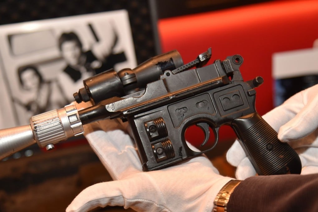 Han Solo's blaster fetched US$550,000 at auction. Photo: AFP