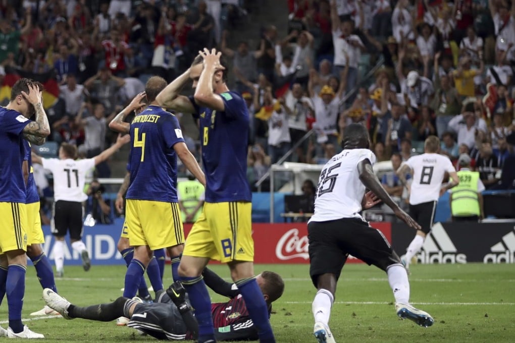 Sweden players reacts after Germany's Toni Kroos, right, scores his side's second goal. Photo: AP