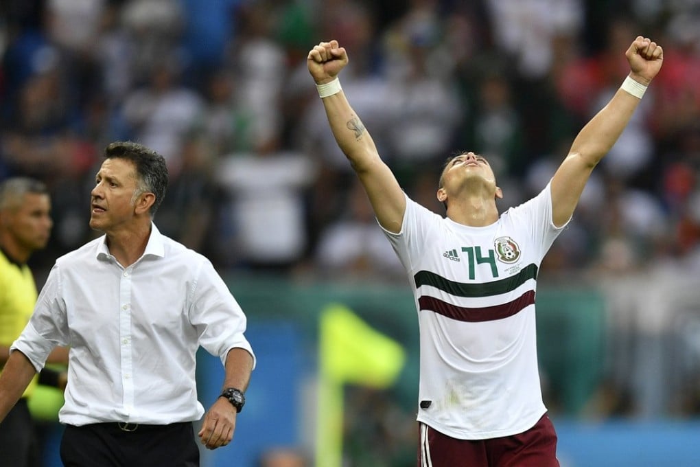 Mexico's Javier Hernandez celebrates beside head coach Juan Carlos Osorio at the end of the group F match against South Korea. Photo: AP