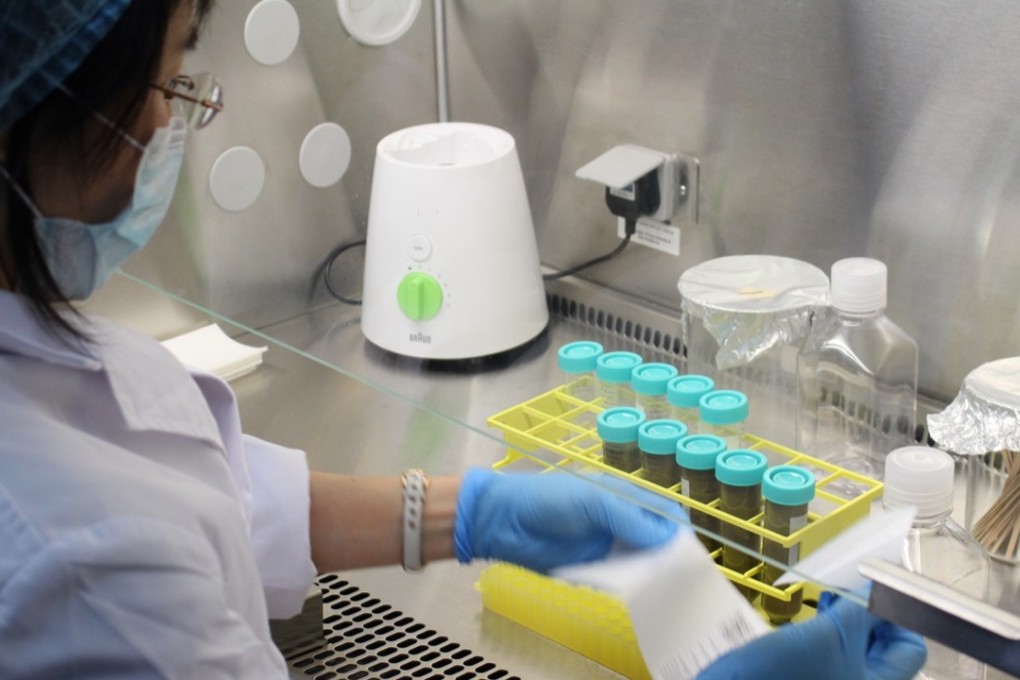 Microbiota transplants are being used to treat a number of serious conditions. A lab technician separates microbiota from a donor stool at AMB in Hong Kong.
