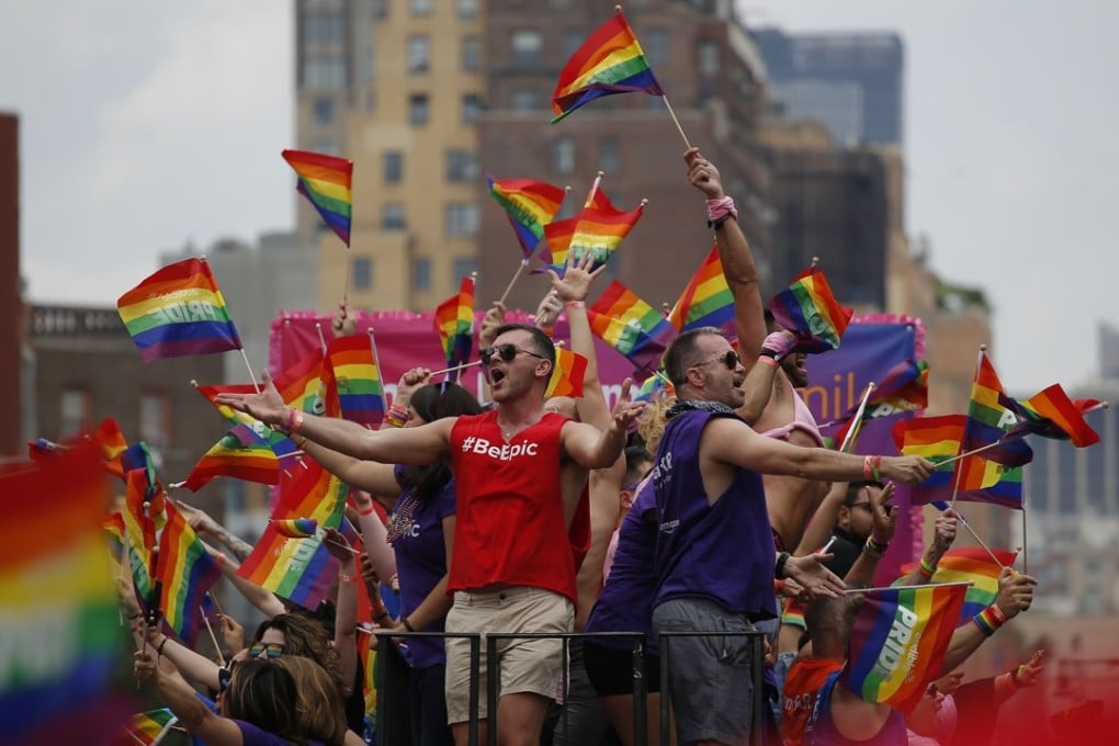 Tens of thousands of people waving rainbow flags and hoisting political banners marched and danced on the streets of New York on Sunday in the latest festive edition of the Gay Pride parade. Photo: AFP/Getty Images